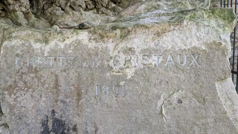 Inscription in the rock  inside the entrance.